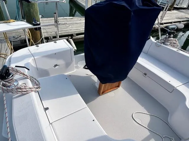 Slide: The Image of Cockpit of a 2015 Catalina 315 sailboat with covered helm and seating. - 8