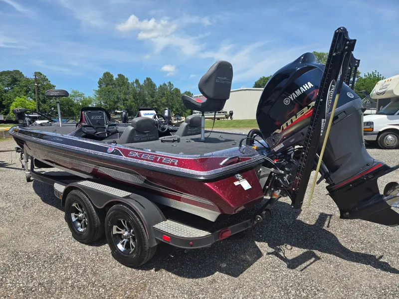 Slide: The Image of 2018 Skeeter ZX 250 boat with Yamaha engine, parked outdoors on a sunny day. - 16