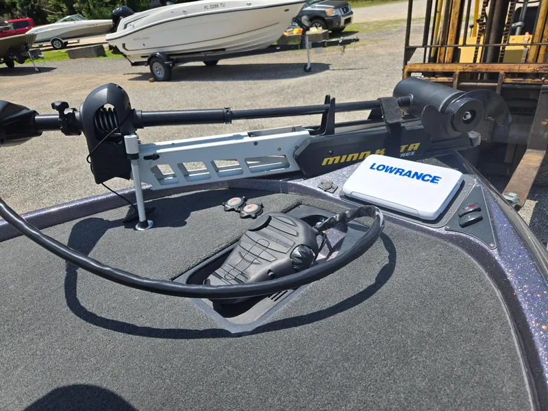 Slide: The Image of 2018 Skeeter ZX 250 boat deck with Minn Kota trolling motor and Lowrance navigation system. - 7