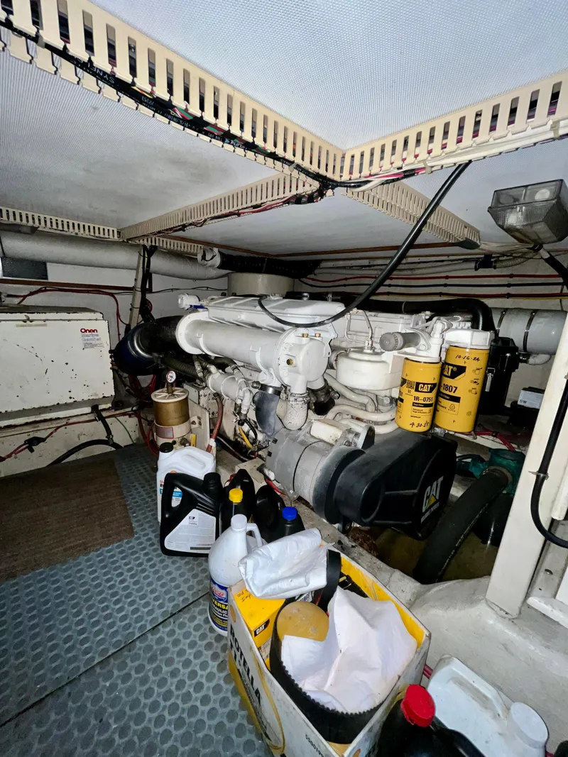 Slide: The Image of Engine room of a 1996 Sabreline 43 Motoryacht with maintenance supplies. - 26