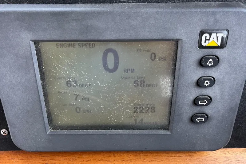 Slide: The Image of CAT engine display on 1996 Sabreline 43 Motoryacht showing speed and RPM. - 29