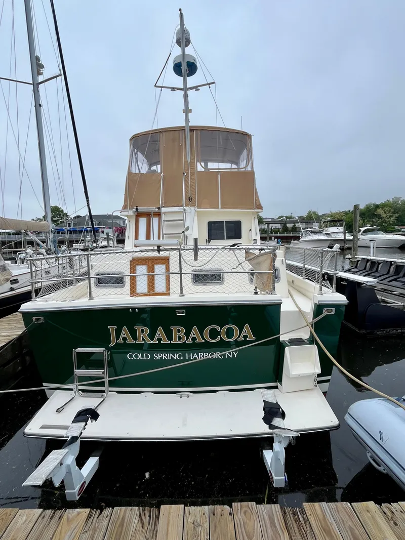 Slide: The Image of Sabreline 43 Motoryacht 1996 docked, named "Jarabacoa," in Cold Spring Harbor, NY. - 3