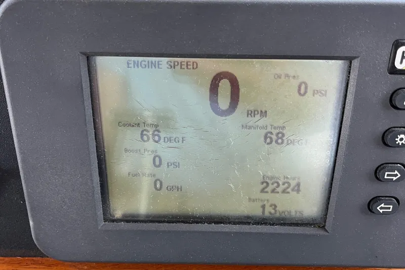 Slide: The Image of Display panel of 1996 Sabreline 43 Motoryacht showing engine speed and temperature readings. - 30