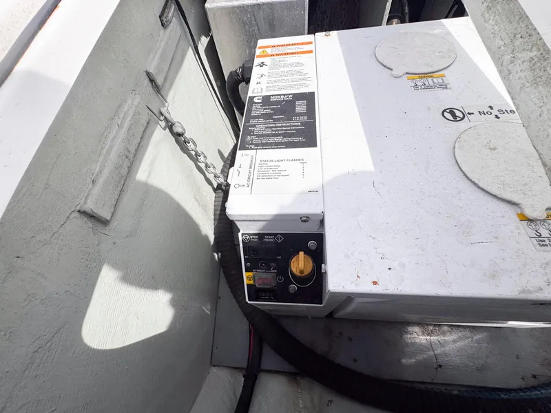 Slide: The Image of Electrical panel on a 2007 Leopard 43 boat, featuring control switches and safety instructions. - 40