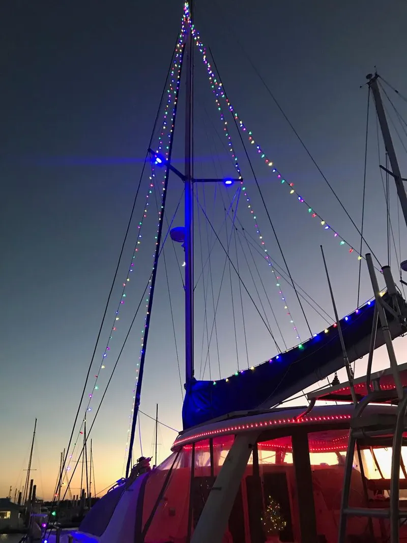 Slide: The Image of Sailboat with festive lights at sunset, Leopard 43 model, 2007. - 8