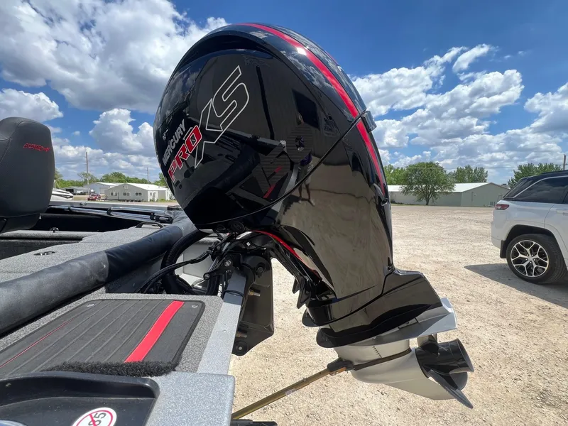 Slide: The Image of 2007 Lund 1800 Pro-V SE boat with Mercury Pro XS outboard motor under a blue sky. - 6