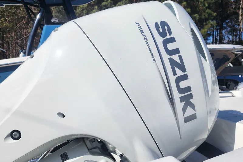 Slide: The Image of 2025 Sea Pro 172 Bay with Suzuki four-stroke outboard engine, close-up view. - 15