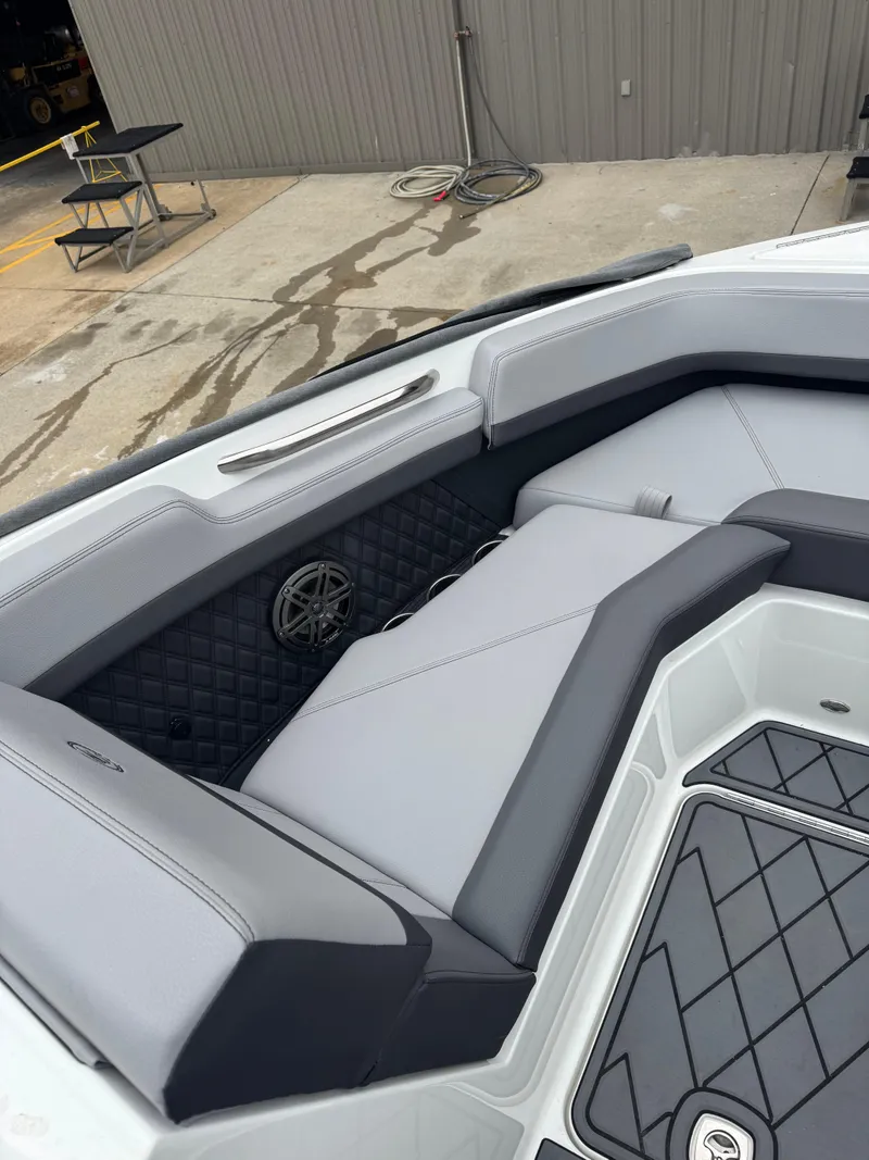 Slide: The Image of 2023 Cobalt R4 boat interior with sleek gray seating and modern design. - 13