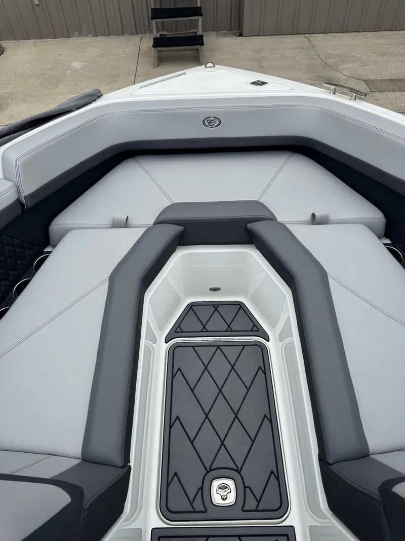 Slide: The Image of 2023 Cobalt R4 boat interior with sleek gray seating and modern design. - 14