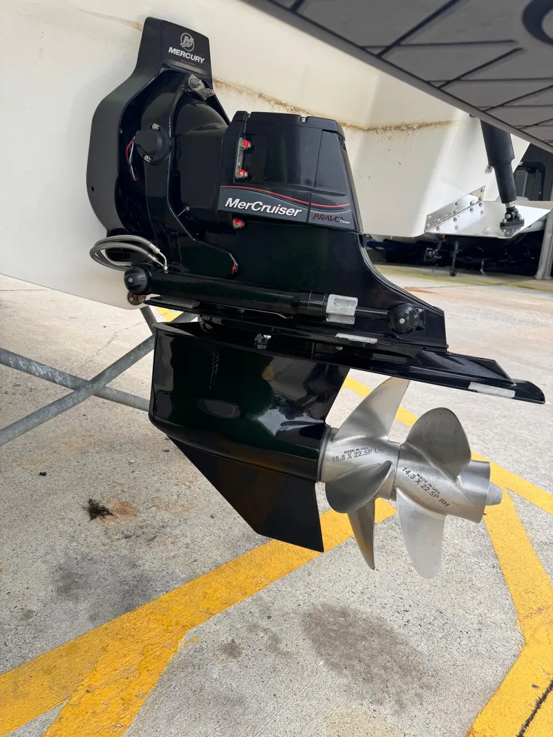 Slide: The Image of Cobalt R4 2023 boat with MerCruiser engine and propeller, displayed on a stand. - 5