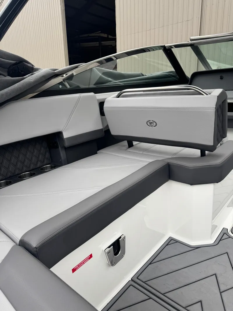 Slide: The Image of 2023 Cobalt R4 boat interior with sleek gray seating and modern design. - 7