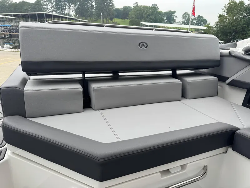 Slide: The Image of 2023 Cobalt R4 boat seating with gray upholstery and adjustable backrest. - 8