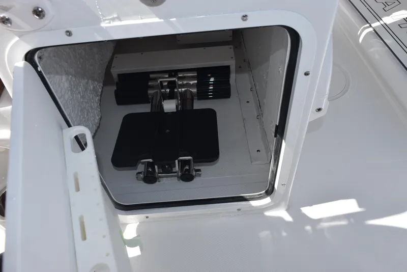 Slide: The Image of Compartment of 2025 Sea Hunt Ultra 245 SE boat, showcasing interior details. - 18