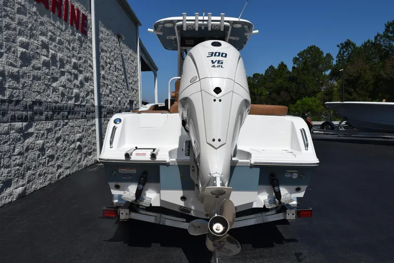 Slide: The Image of 2025 Sea Hunt Ultra 245 SE boat with powerful 300 V6 engine, rear view. - 4