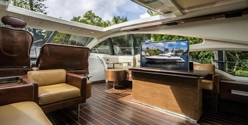 Slide: The Image of Luxurious interior of 2005 Azimut 68S yacht with leather seating and large windows. - 3