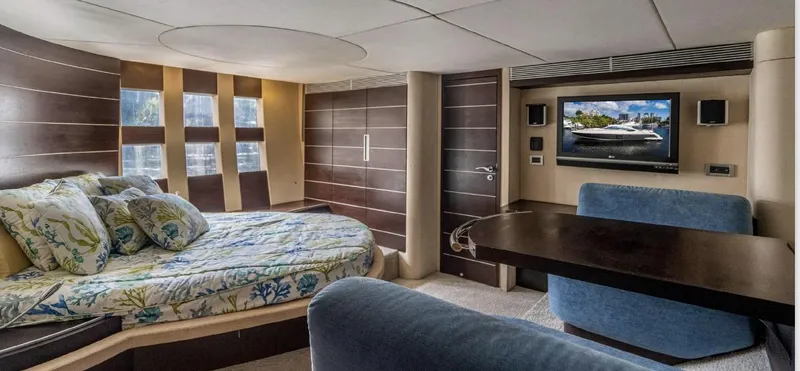 Slide: The Image of Luxurious interior of 2005 Azimut 68S yacht with modern decor and comfortable seating. - 6