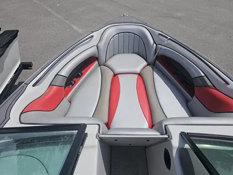 Slide: The Image of 2023 Sanger V237 SX boat interior with red and gray seating. - 13