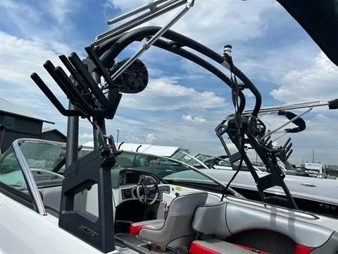 Slide: The Image of 2023 Sanger V237 SX boat interior with wakeboard tower and seating. - 8