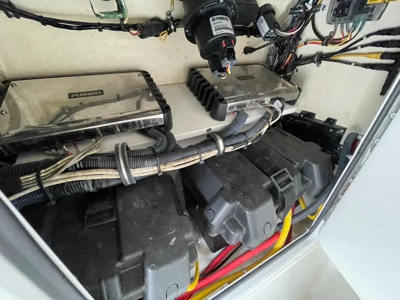Slide: The Image of Electrical components and wiring inside a 2021 Regulator 26XO boat. - 41