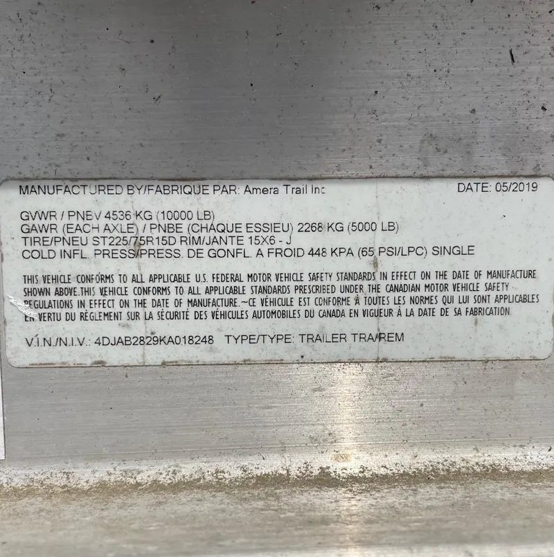 Slide: The Image of 2021 Regulator 26XO trailer label with specifications and compliance details. - 46