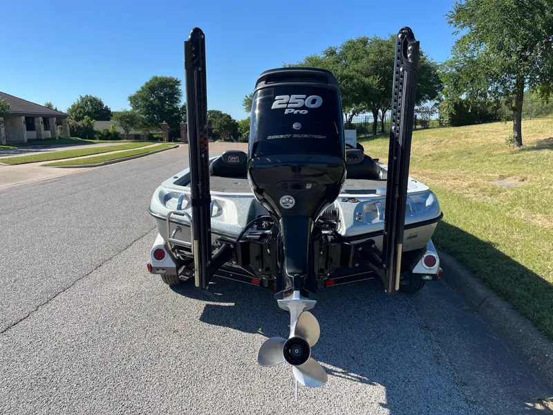 Slide: The Image of 2016 Ranger Z520 boat with 250 Pro motor on a sunny street. - 48