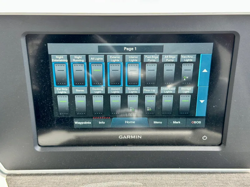 Slide: The Image of Garmin control panel on 2022 Manitou 25 LX SHP DE boat, displaying various system settings. - 12