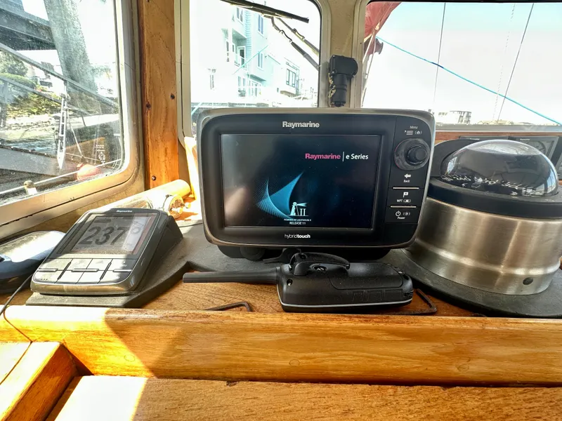 Slide: The Image of Navigation equipment on 1985 Fisher 34 Pilothouse Ketch, featuring Raymarine e Series display. - 14