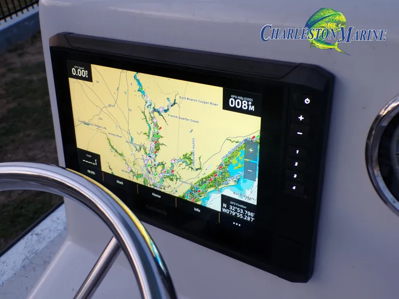 Slide: The Image of 2023 Panga 22 boat with navigation display showing detailed marine map. - 13