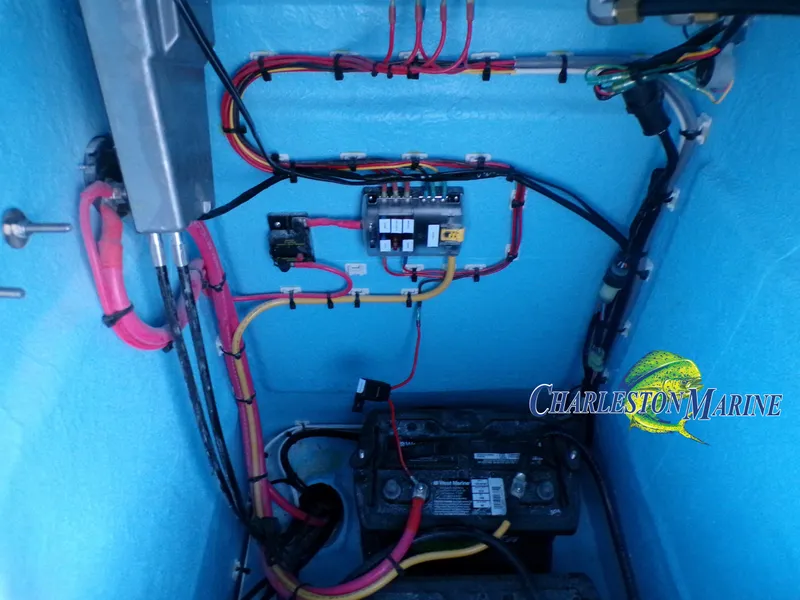 Slide: The Image of Electrical wiring and battery setup in a 2023 Panga 22 boat. - 17