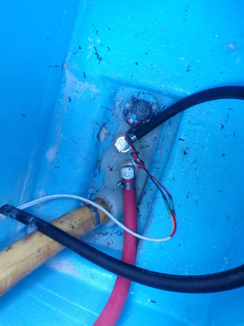 Slide: The Image of Electrical wiring inside a 2023 Panga 22 boat, featuring cables and connectors. - 18