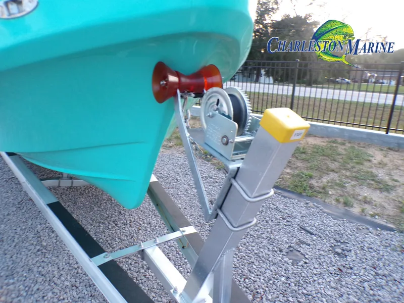 Slide: The Image of 2023 Panga 22 boat on trailer at Charleston Marine dealership. - 25