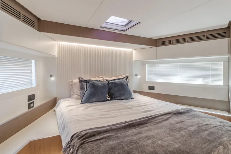 Slide: The Image of Luxurious bedroom interior of 2023 Azimut Magellano 66 yacht with modern design. - 46