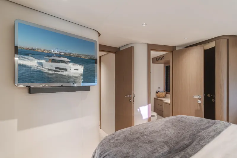 Slide: The Image of Luxurious interior of 2023 Azimut Magellano 66 yacht with modern design and elegant furnishings. - 47