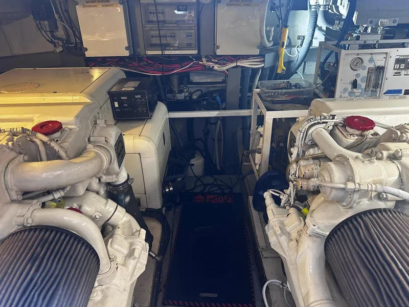 Slide: The Image of Luxurious cabin interior of 2000 Sunseeker Predator 56 yacht with bed and seating area. - 11