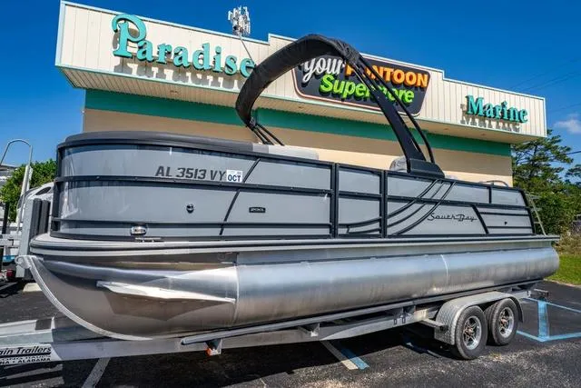 Slide: The Image of 2024 South Bay S224 UL 3.0 pontoon boat on trailer at Paradise Marine. - 1
