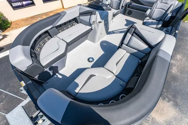 Slide: The Image of 2024 South Bay S224 UL 3.0 pontoon boat interior with luxurious seating and modern design. - 10