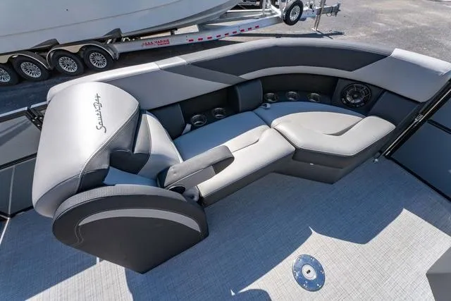 Slide: The Image of 2024 South Bay S224 UL 3.0 boat interior with sleek, modern seating design. - 11