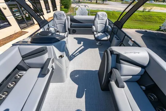 Slide: The Image of 2024 South Bay S224 UL 3.0 pontoon boat interior with luxurious seating and modern design. - 14