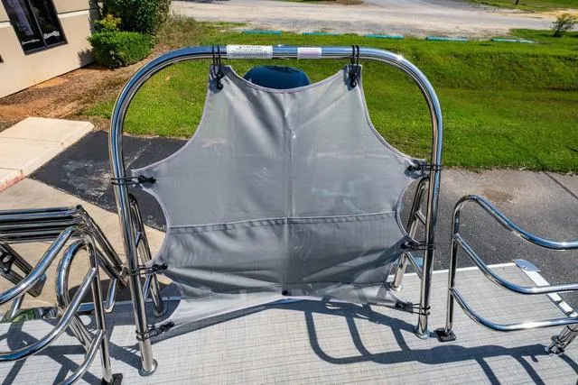 Slide: The Image of 2024 South Bay S224 UL 3.0 boat with stainless steel railing and gray fabric panel. - 19