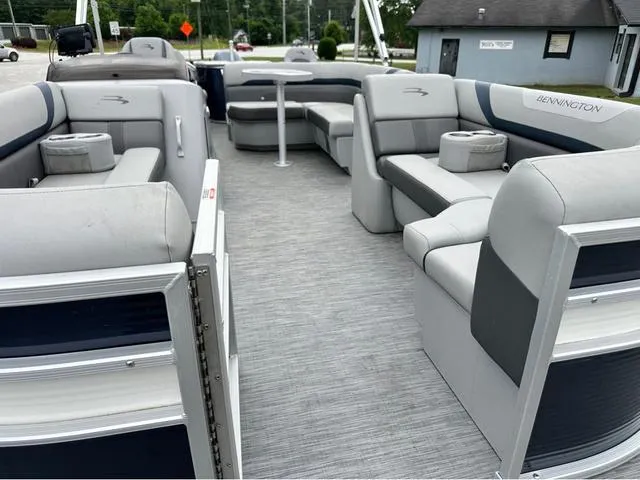 Slide: The Image of 2022 Bennington 22 SXFAPG pontoon boat with spacious seating and modern design. - 12