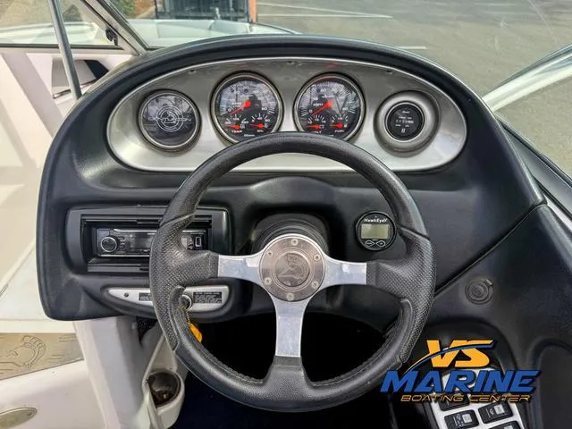 Slide: The Image of 2006 Centurion ELITE V boat dashboard with steering wheel and gauges, VS Marine logo visible. - 17