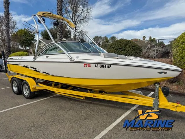 Slide: The Image of 2006 Centurion ELITE V boat on yellow trailer at VS Marine Boating Center. - 2