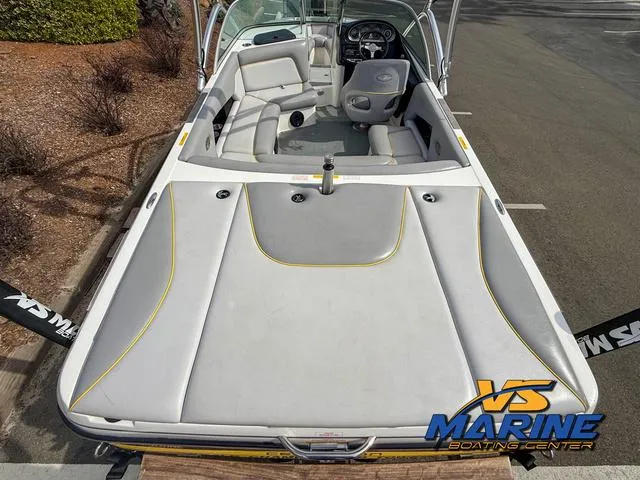 Slide: The Image of 2006 Centurion ELITE V boat interior with gray seating, steering wheel, and VS Marine logo. - 8