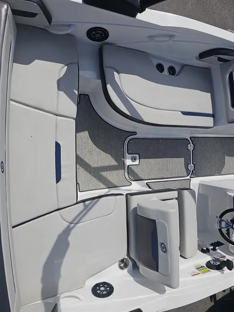 Slide: The Image of 2022 Hurricane SunDeck Sport 205 IO boat interior with spacious seating and modern design. - 25