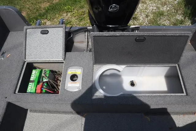 Slide: The Image of 2018 Lund 1875 Impact SC boat compartments with battery storage and livewell. - 10