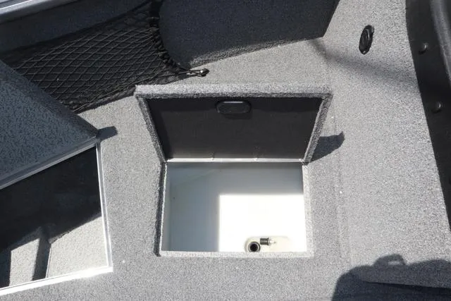 Slide: The Image of 2018 Lund 1875 Impact SC boat storage compartment with open hatch. - 21