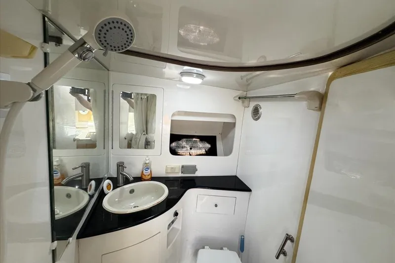 Slide: The Image of Bathroom interior of 1994 President 445 Sundeck yacht, featuring sink and shower. - 108