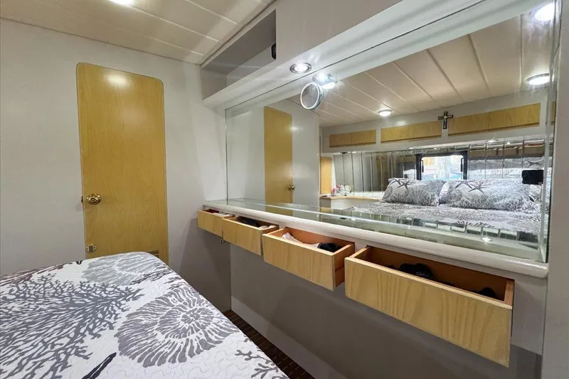 Slide: The Image of Interior of 1994 President 445 Sundeck yacht with mirror and wooden drawers. - 131