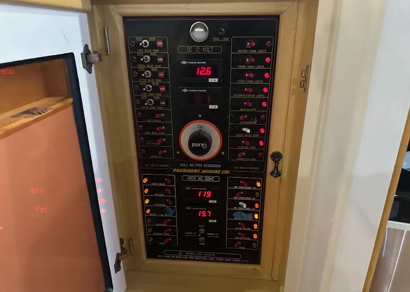 Slide: The Image of Control panel of a 1994 President 445 Sundeck yacht with gauges and switches. - 30