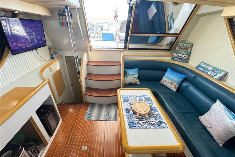 Slide: The Image of Luxurious interior of 1994 President 445 SUNDECK yacht with cozy seating and decor. - 60